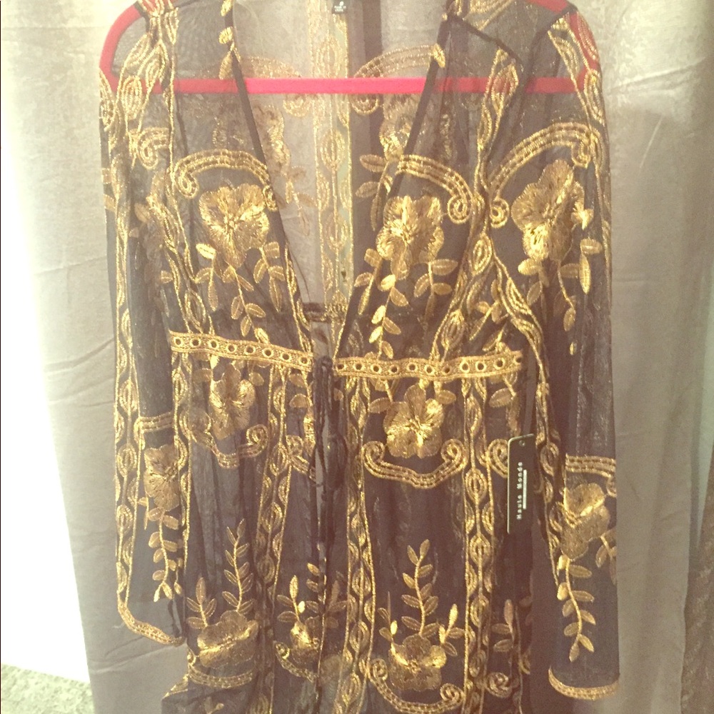 Brand new tulle see-through gold and black cover